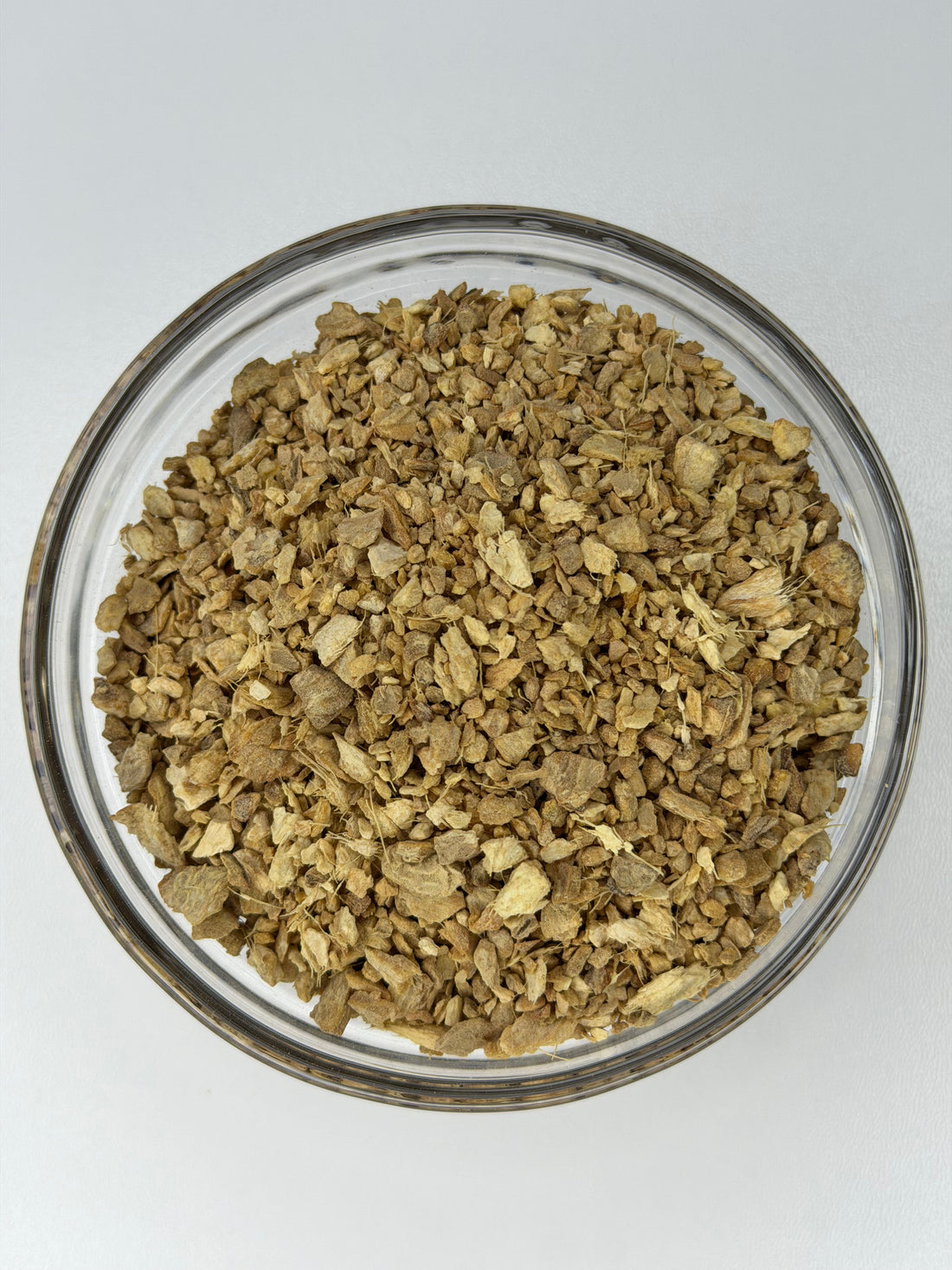 Dried cut and sifted ginger root, Zingiber officinale, jengibre, ready to brew as tea