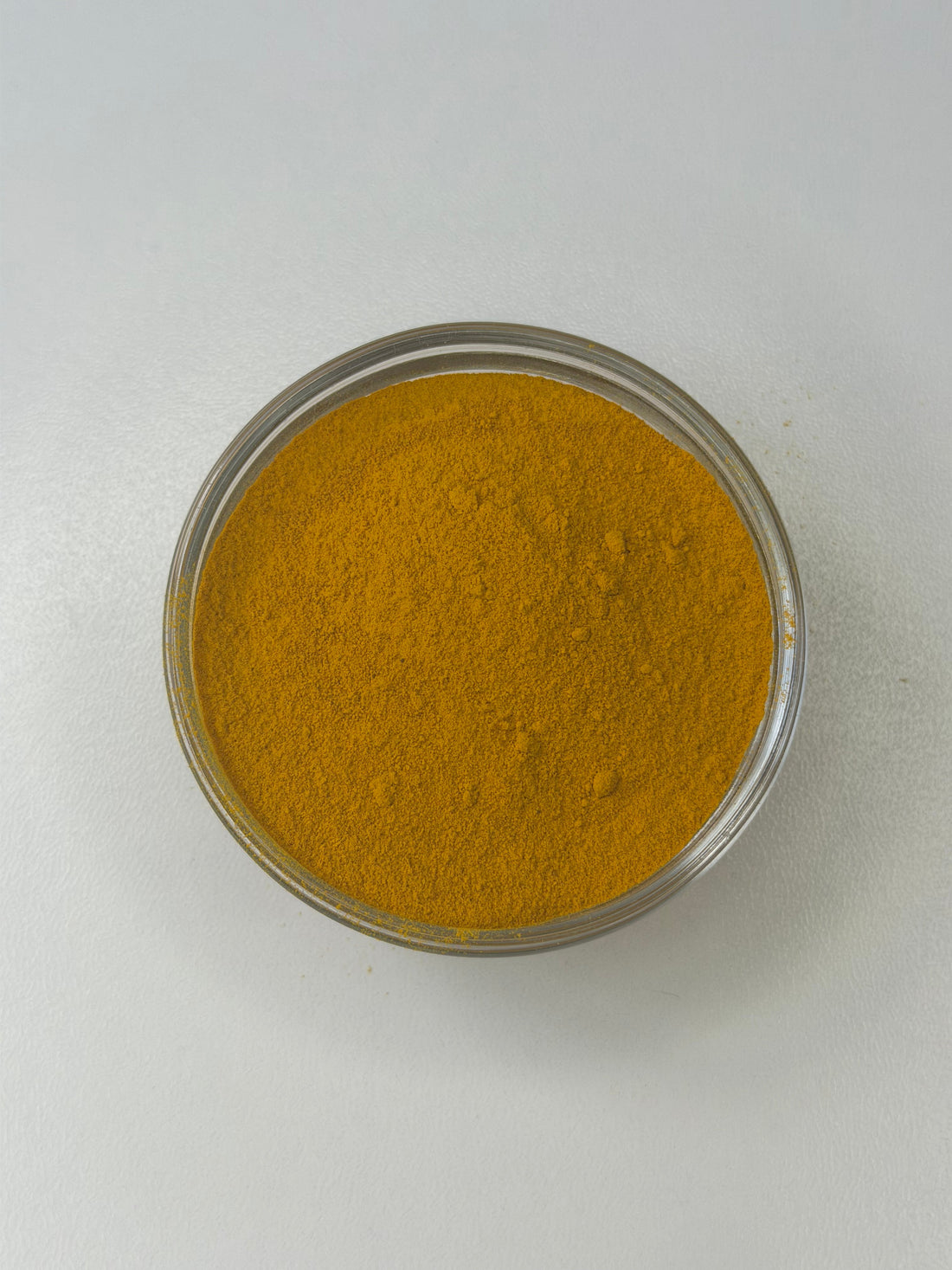 Ground turmeric root powder, Curcuma longa, curcuma, for golden milk and turmeric tea