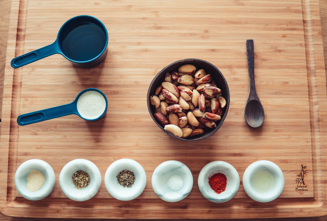 Brazilian nuts with spices on a wooden cutting board